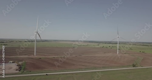 Dolly shot of two wind power generators