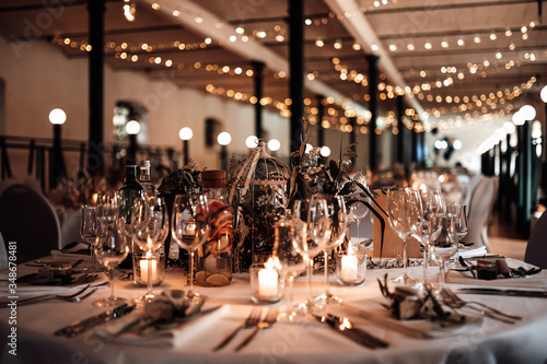 photo of a wedding location with dinner tables photo