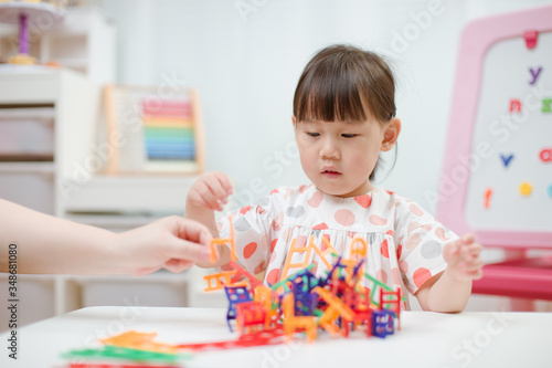 toddler girl play balance chair and ladder  toy at home photo