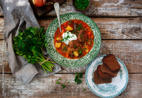 rassolnik ,traditional russian soup with pickles.style rustic photo