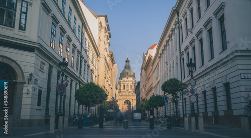 The famous roman catholic cathedral of Szent Istvan in Budapest, seen from the shopping street in front of it on a sunny autumn day.