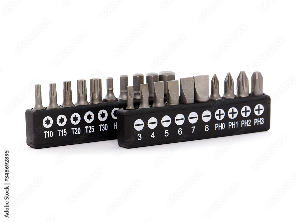 Set of screwdriver bits, heads, tips, isolated on white Set of screwdriver bits, heads, tips, isolated on white
