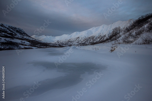 Frozen water in the mountains photo