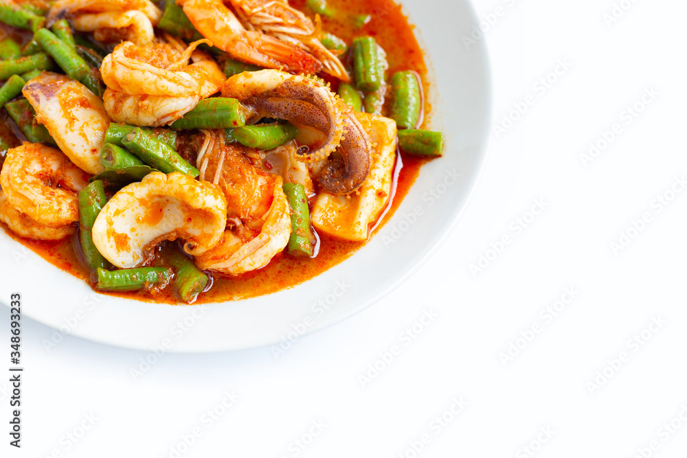 Spicy stir fried seafood and yard long bean with red curry paste. Thai food Spicy stir fried seafood and yard long bean with red curry paste. Thai food