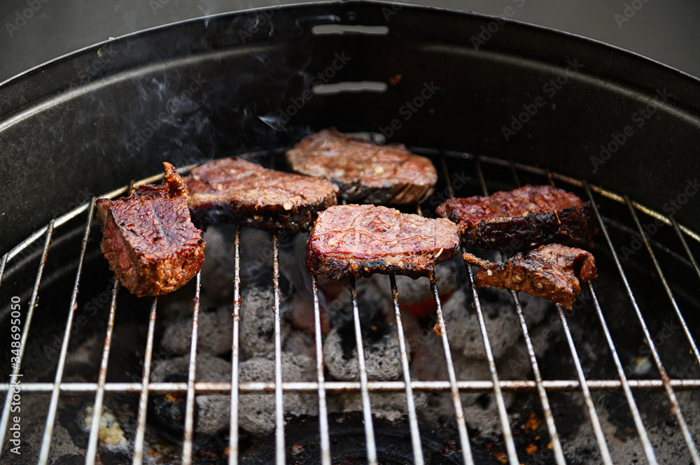 Grilled beef steaks. Selective focus. Grilled beef steaks. Selective focus.