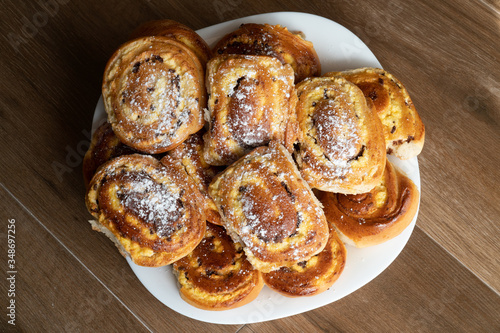 Cheesecake, pie with cottage cheese. Pies sprinkled with powdered sugar