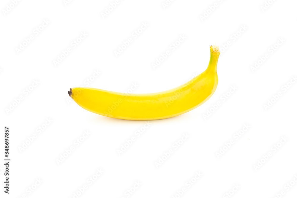 Single banana isolated. One yellow natural tasty banana on a white background.