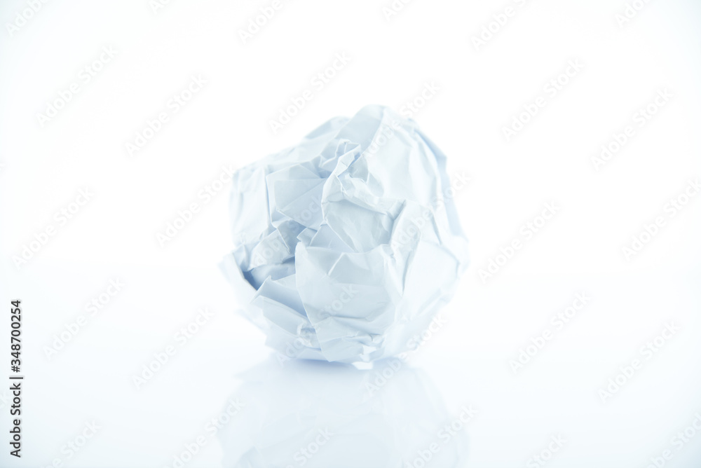 Crumpled paper ball, rejection and failure idea.