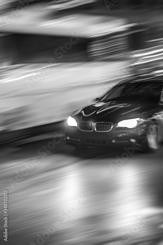 Motion of a Black Car, Sedan, in the Street at Night, traffic, movement © JosephSpoon