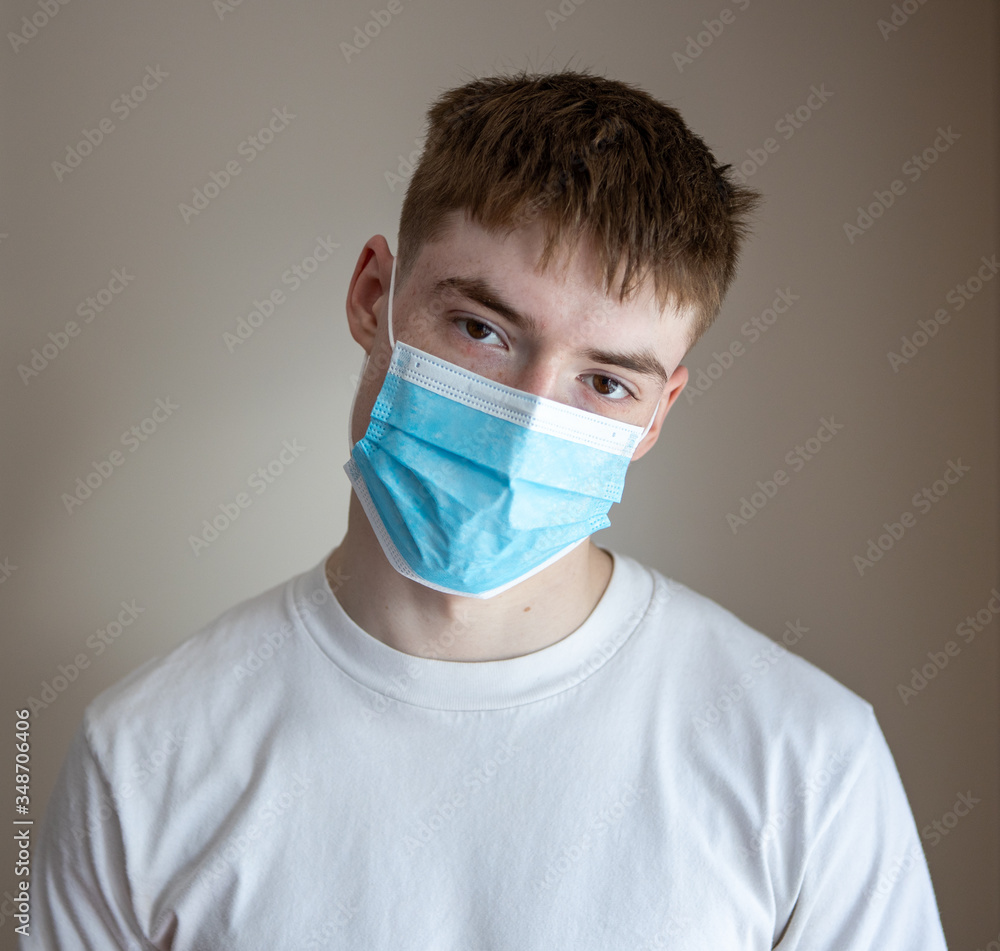 young man with mask to protect from disease
