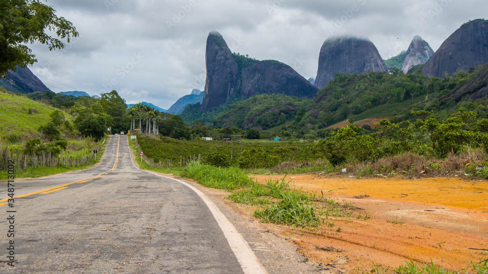Road in the middle of Pancas Rock Mountains, Espírito Santo, Brazil