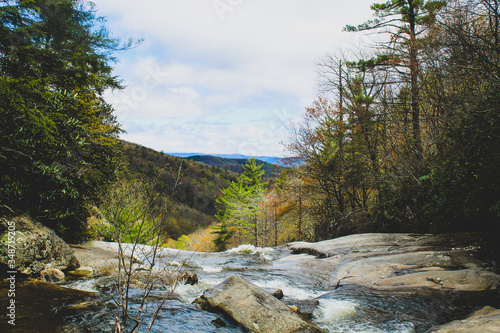 Gentle flowing stream and waterfall in Pisgah National Forest in North Carolina