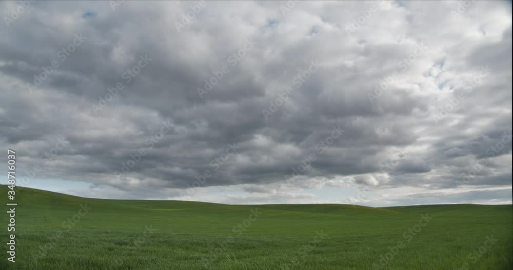 Countryside in Ukraine Beautiful green field with fast storm clouds. Countryside in Ukraine Beautiful green field with fast storm clouds.