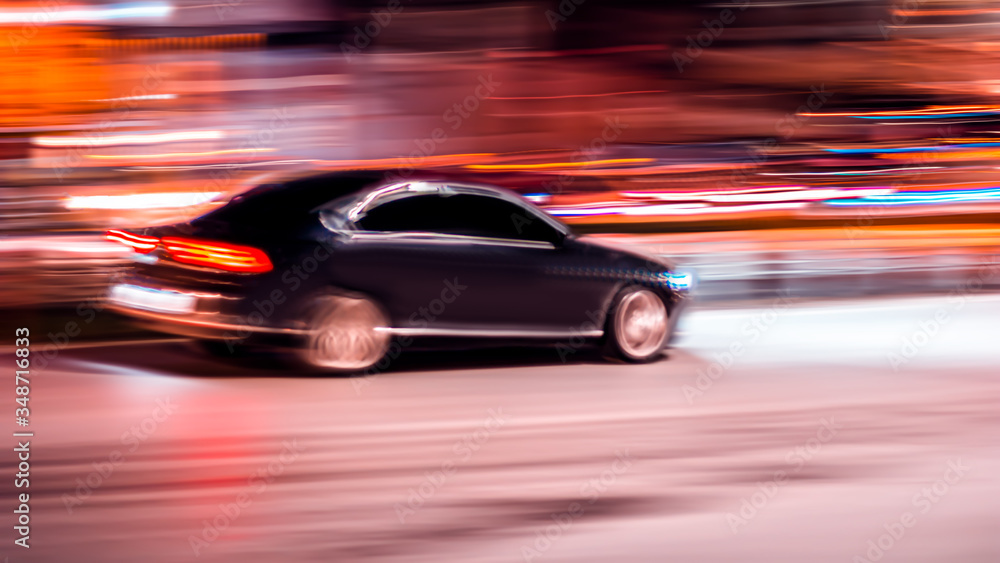 Fast moving, motion car on a black background  