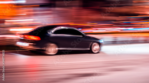 Fast moving  motion car on a black background  