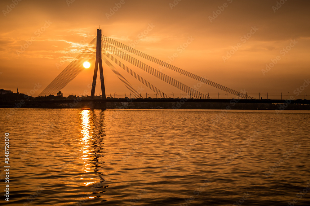 Fototapeta premium Sunset in Riga over a river of Daugava