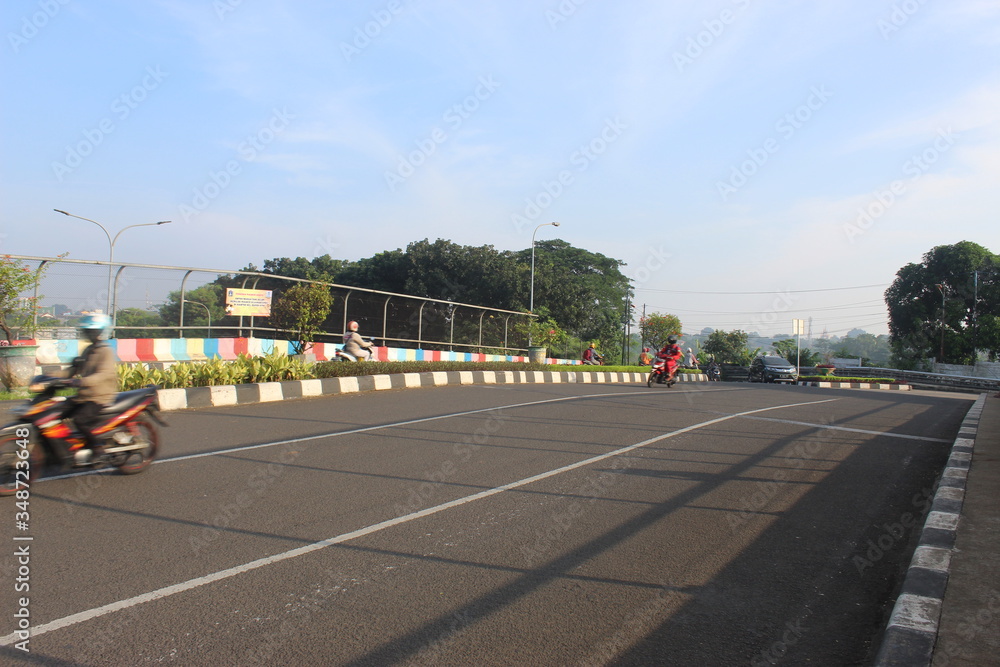 Morning atmosphere on the road during the corona virus pandemic in the city of Jakarta. The road is deserted