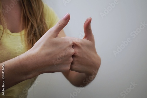 Woman interpreting American Sign Language (ASL)