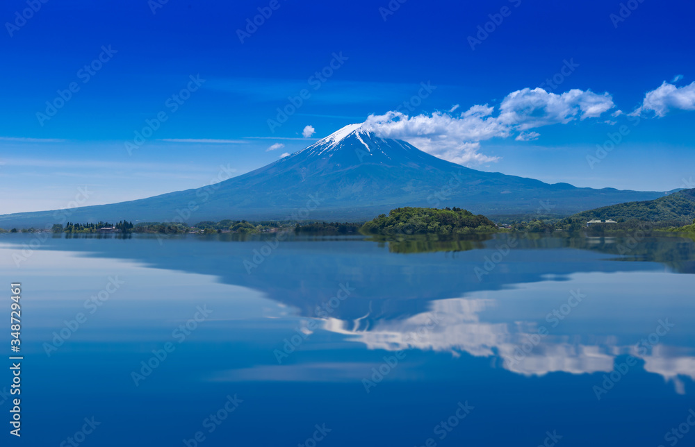 Mountain Fuji reflect with water at Lake Kawaguchi, Japan