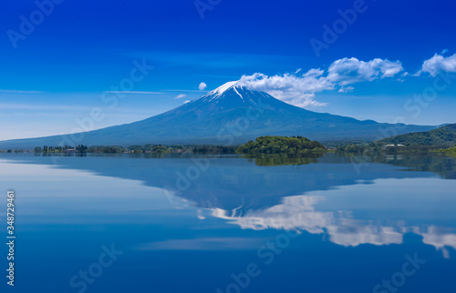 Mountain Fuji reflect with water at Lake Kawaguchi, Japan