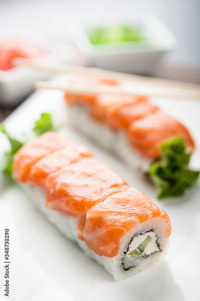 Uramaki sushi gurme maki on a dish