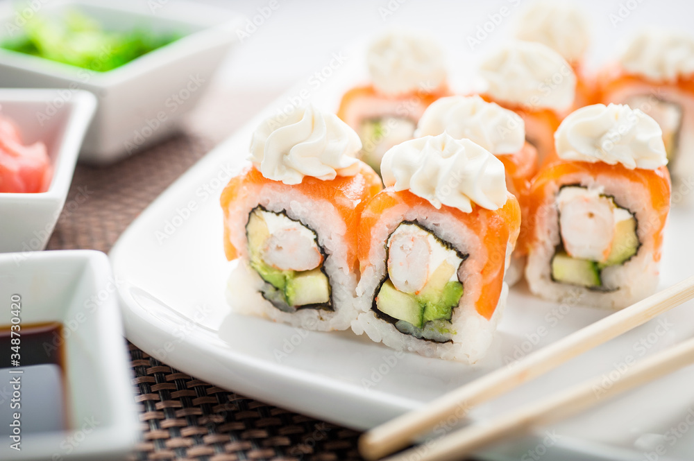 Uramaki sushi nidzi maki on a dish