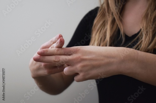 Woman interpreting American Sign Language
