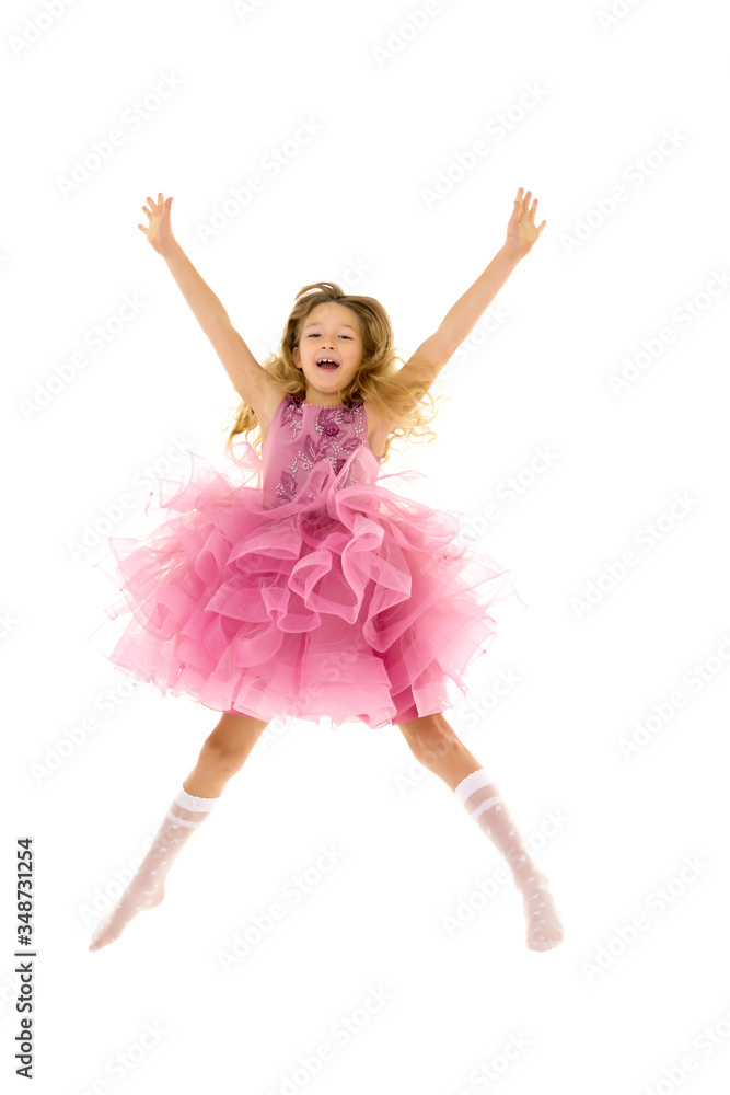 The little girl is jumping fun.The concept of a good mood, summe The little girl is jumping fun.The concept of a good mood, summe