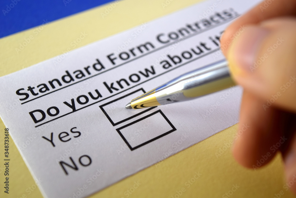 One person is answering question about standard form contracts. One person is answering question about standard form contracts.