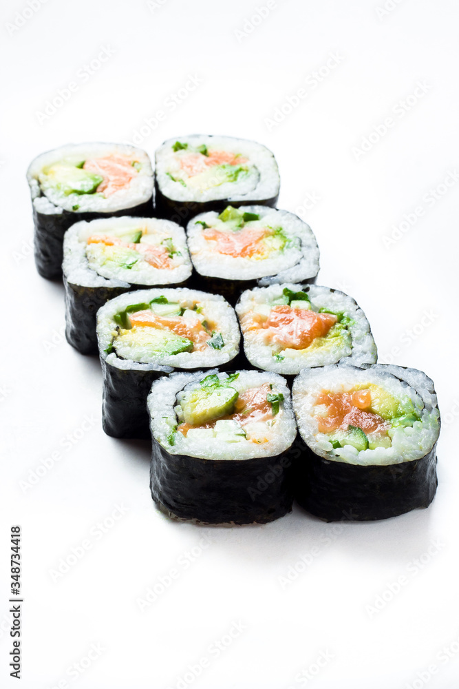 Sushi uramaki rolls with seaweed around them Sushi uramaki rolls with seaweed around them