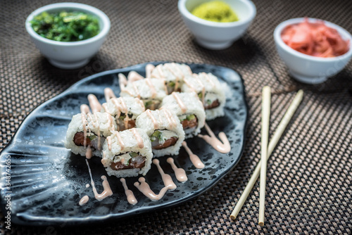 Sushi HOKU maki with salmon, prawns, cream cheese photo