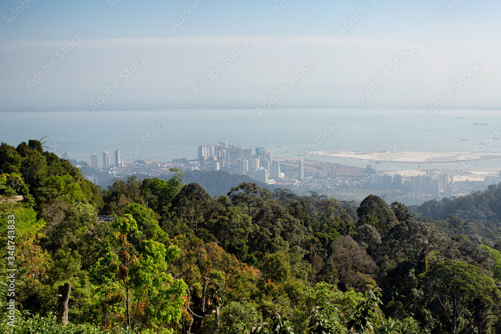 Obraz premium Lookng down through very heavy pollution haze to the city of George Town on Penang Island