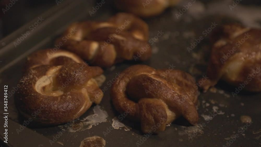 Freshly Baked Homemade Pretzels On The Baking Tray. - close up shot