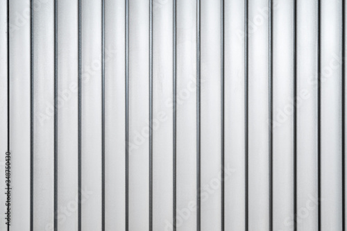 White Corrugated metal texture surface in the vertical line background or texture