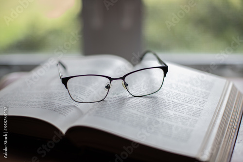 glasses on book