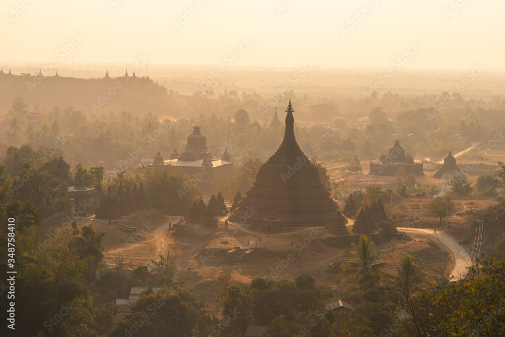 Buddhist pagoda and temple at sunset in Mrauk U ancient city, Rakhine state in Myanmar