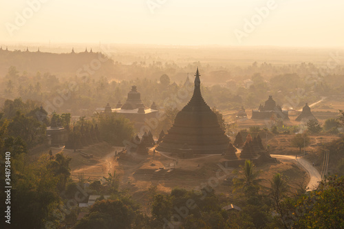 Buddhist pagoda and temple at sunset in Mrauk U ancient city, Rakhine state in Myanmar © skazzjy