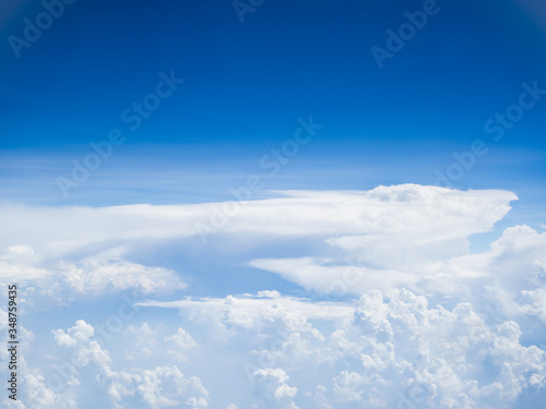 View of blue sky background with white cloud © YUU-ME