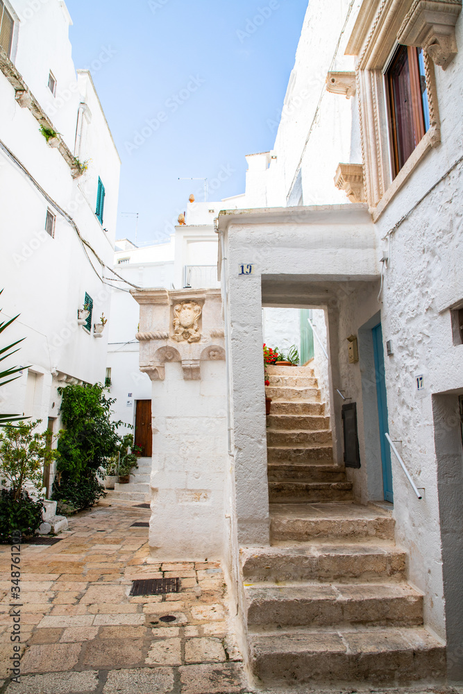 Typical alley in beautiful small town of Cisternino, Apulia, South Italy