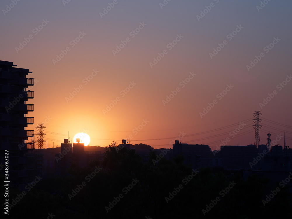 Naklejka premium Tokyo,Japan-May 14, 2020: Sunrise at the suburb of Tokyo 