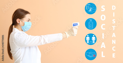 Doctor with thermometer on ...