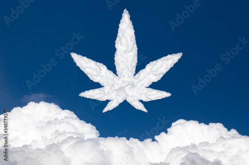 Wallpaper Mural marijuana leaf cloud against a bright blue cloudy sky Torontodigital.ca