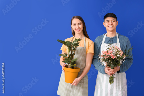 Portrait of florists with p...