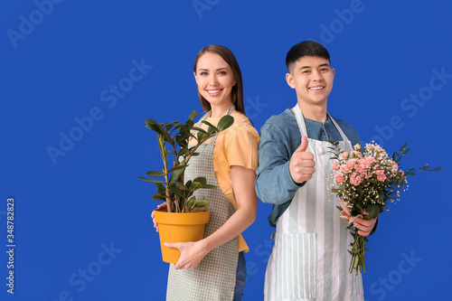 Portrait of florists with p...