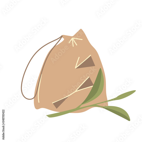 A hand-drawn brown bag of dried green tea. A branch of a Chinese tea plant. The concept of zero waste. Vector illustration on an isolated white background.