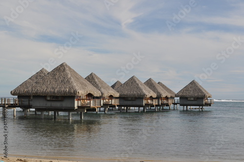 Close up views of the overwater bungalows of tahiti, a popular honeymoon location