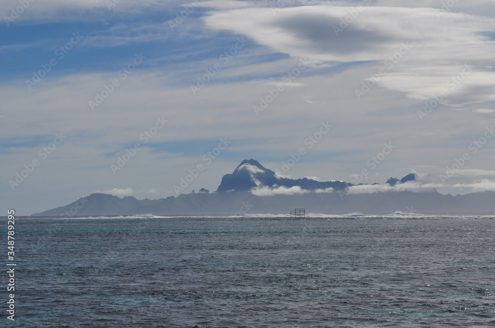 Jagged peaks of Moorea on a sunny morning in the south pacific Jagged peaks of Moorea on a sunny morning in the south pacific