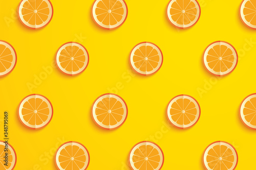 Slices of orange paper art summer background.