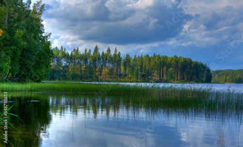 Fototapeta Naklejka Na Ścianę i Meble -  Forest reflection on a lake in Finland