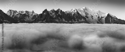 Black and white fine art summer view of the Alps with Mont Blanc (Monte Bianco) on background, Chamonix location. Beautiful outdoor scene in Vallon de Berard Nature Reserve, Graian Alps, France Europe